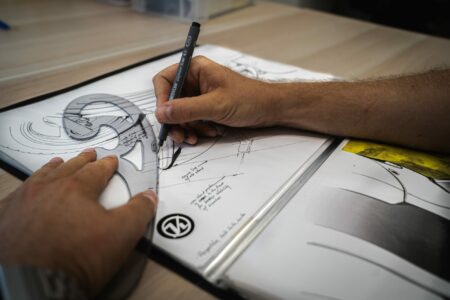 Our product designer carefully drawing the outlines of a new electric scooter model... Pssht! 🤫